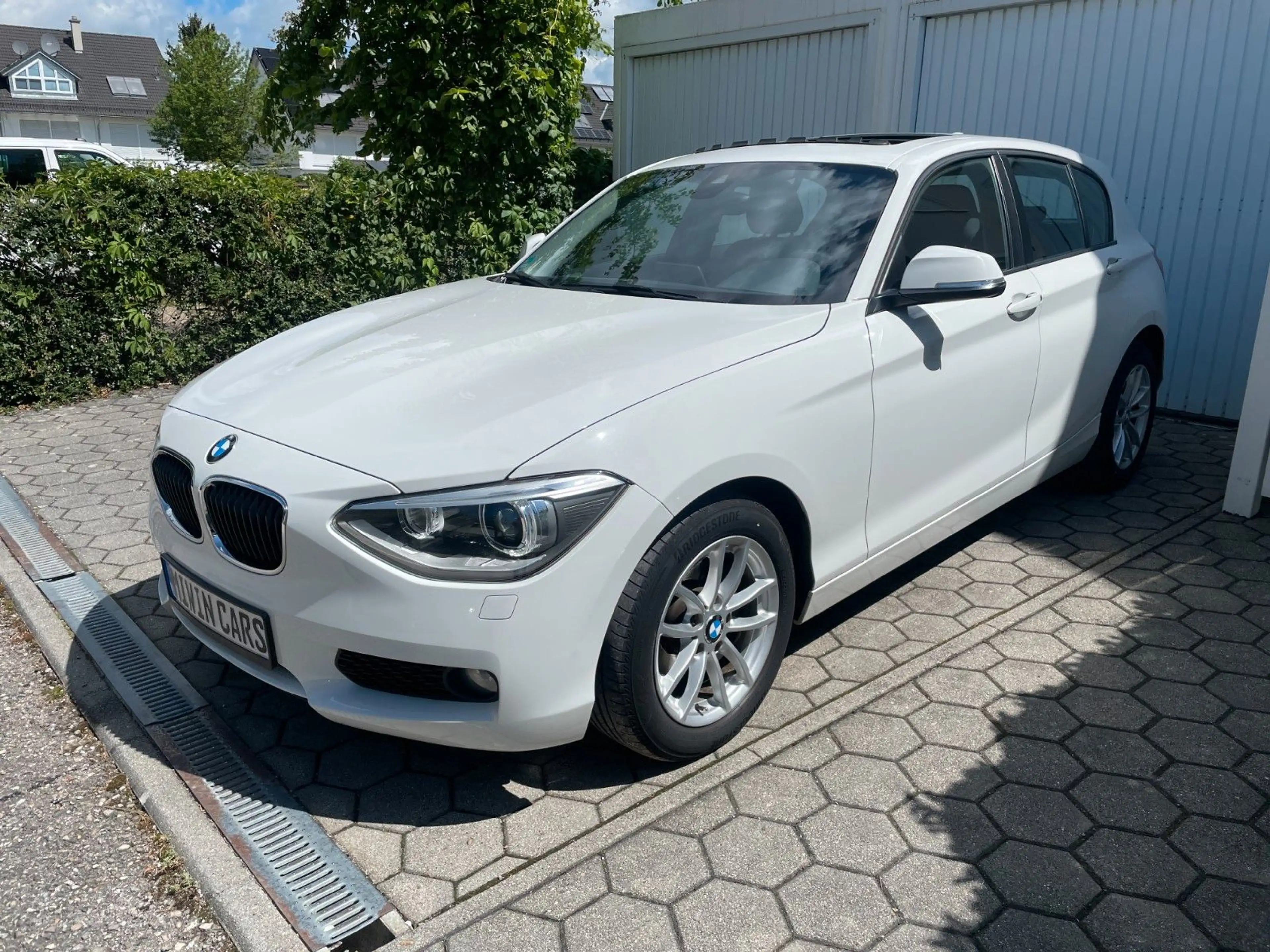 BMW 118 d Xenon Schiebedach — photo 3