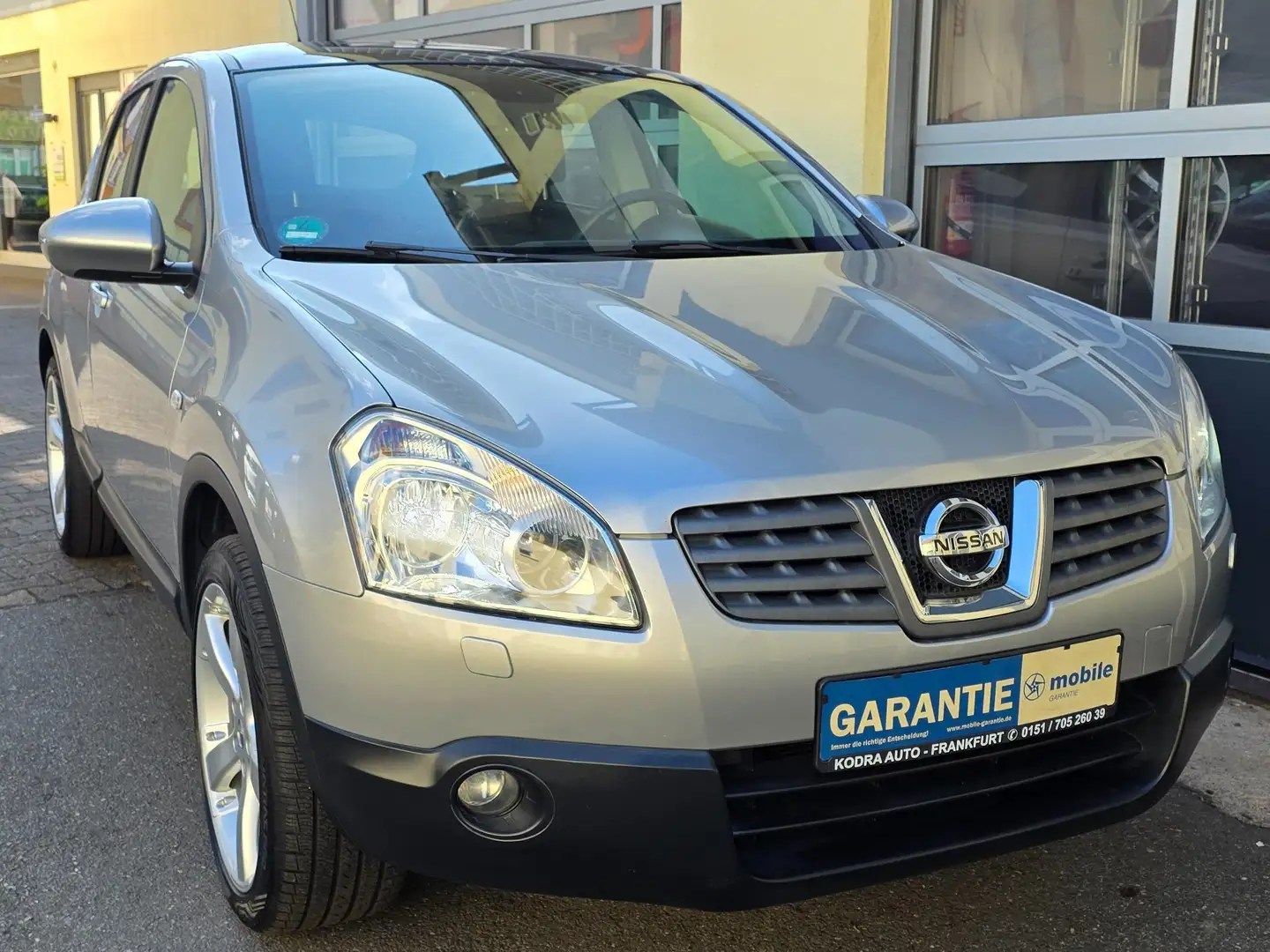 Nissan Qashqai Tekna 4X4*Top Zustand*Leder*Xenon*Pano Grau - 1