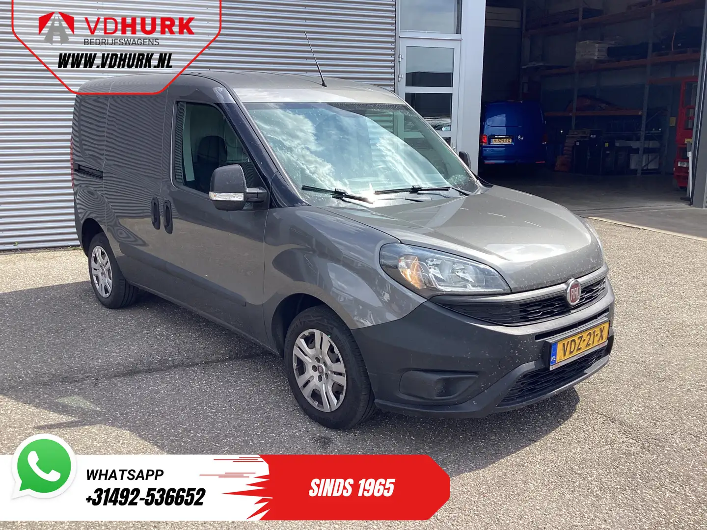 Fiat Doblo Cargo 1.6 MJ 105 pk 3Pers./ Airco/ Cruise/ Navi/ T Grijs - 1