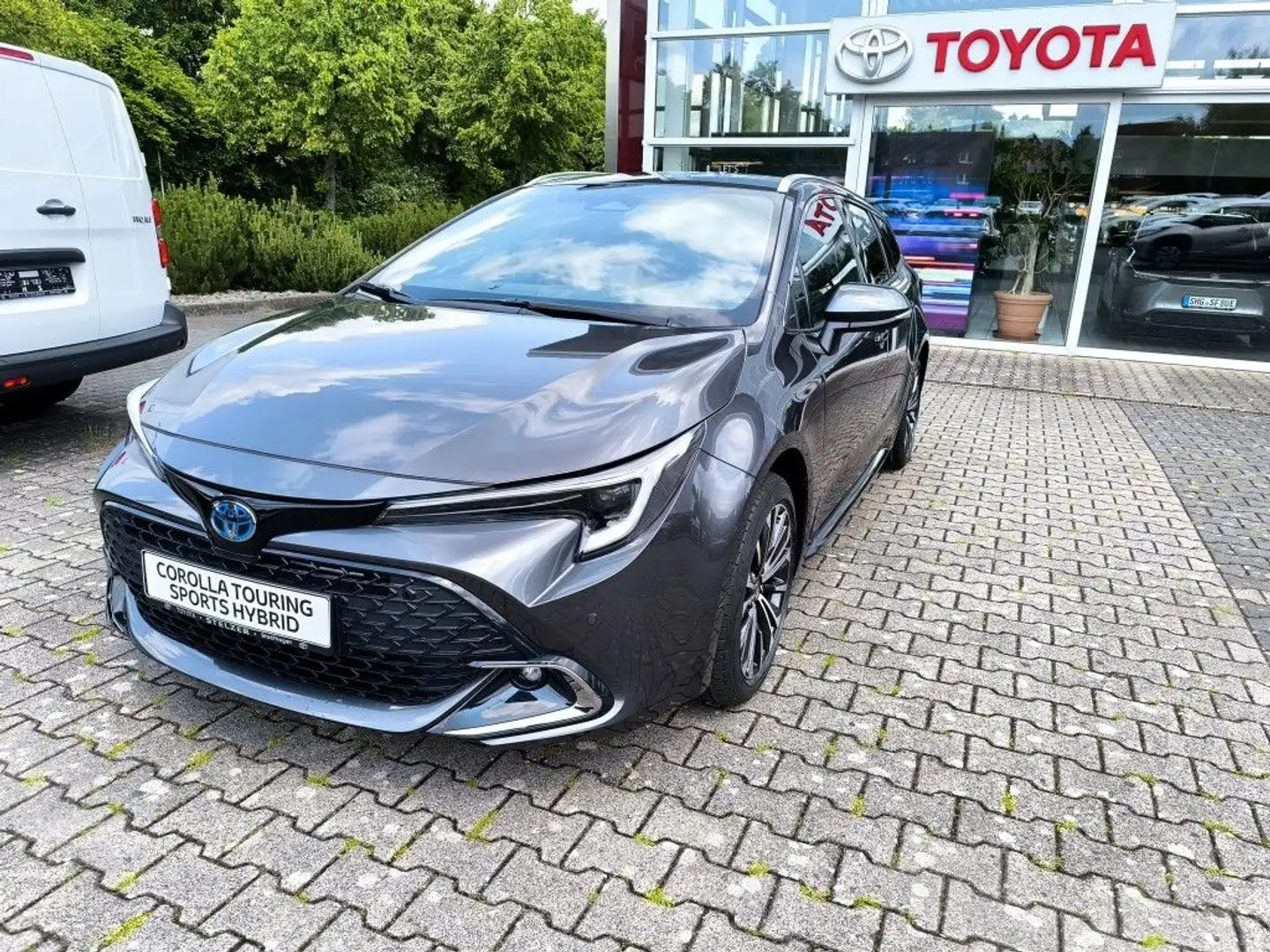 Toyota Corolla 2.0 Hybrid Touring Sports Teamplayer Grau - 1