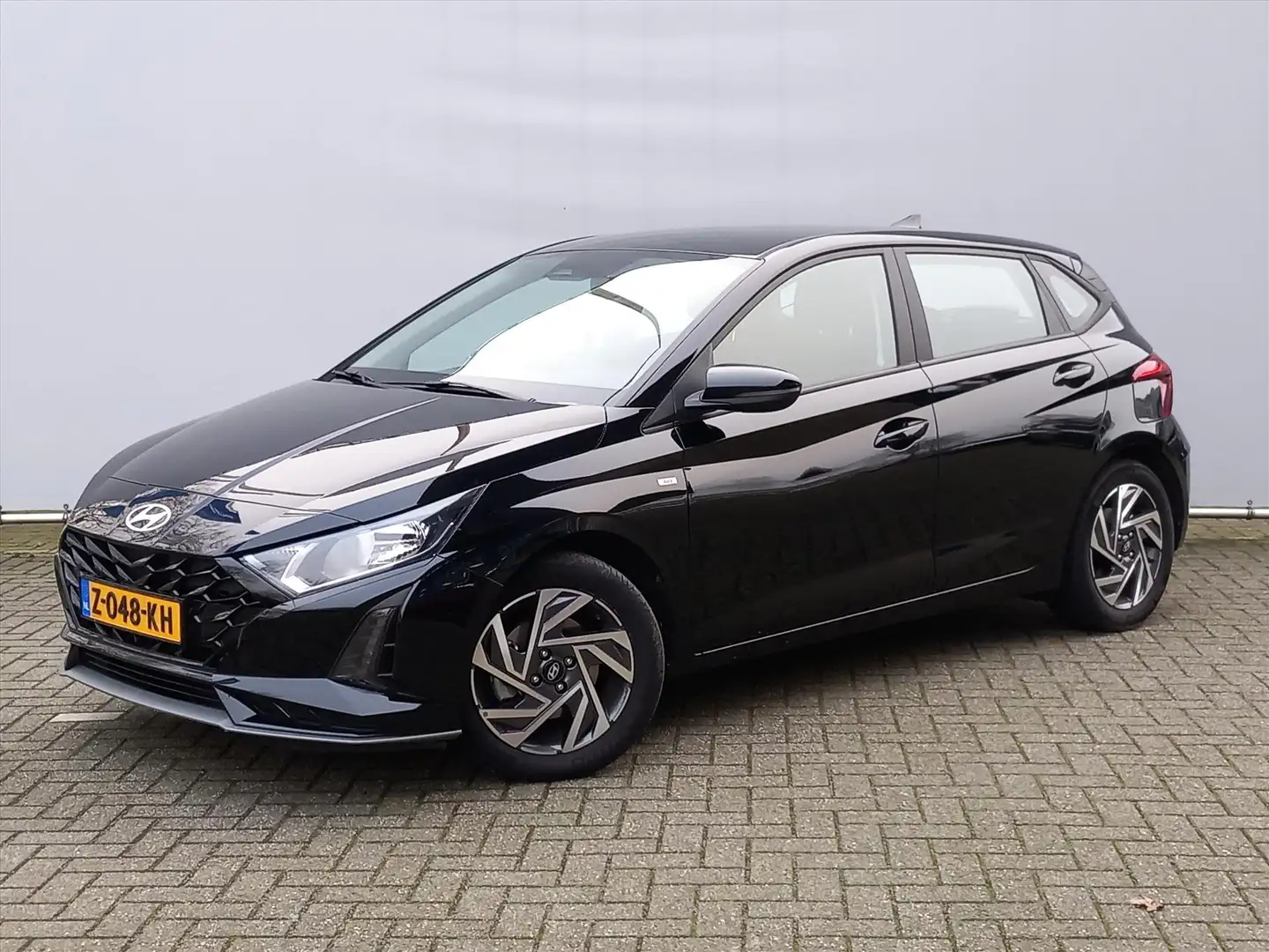 Hyundai i20 1.0 T-GDI MHEV 100pk Comfort | Cruise | Airco | Ap Zwart - 1
