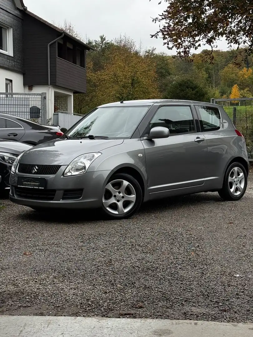 Suzuki Swift 1.3 Lim. Classic/KLIMA/8-FACH/USB/ Grau - 1