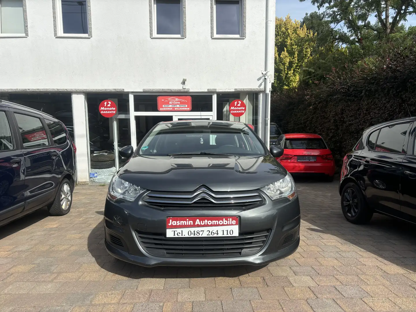 Citroen C4 1.4i*AIRCO*5PORTES*CARNET*AVEC CT-CARPASS* Gris - 2
