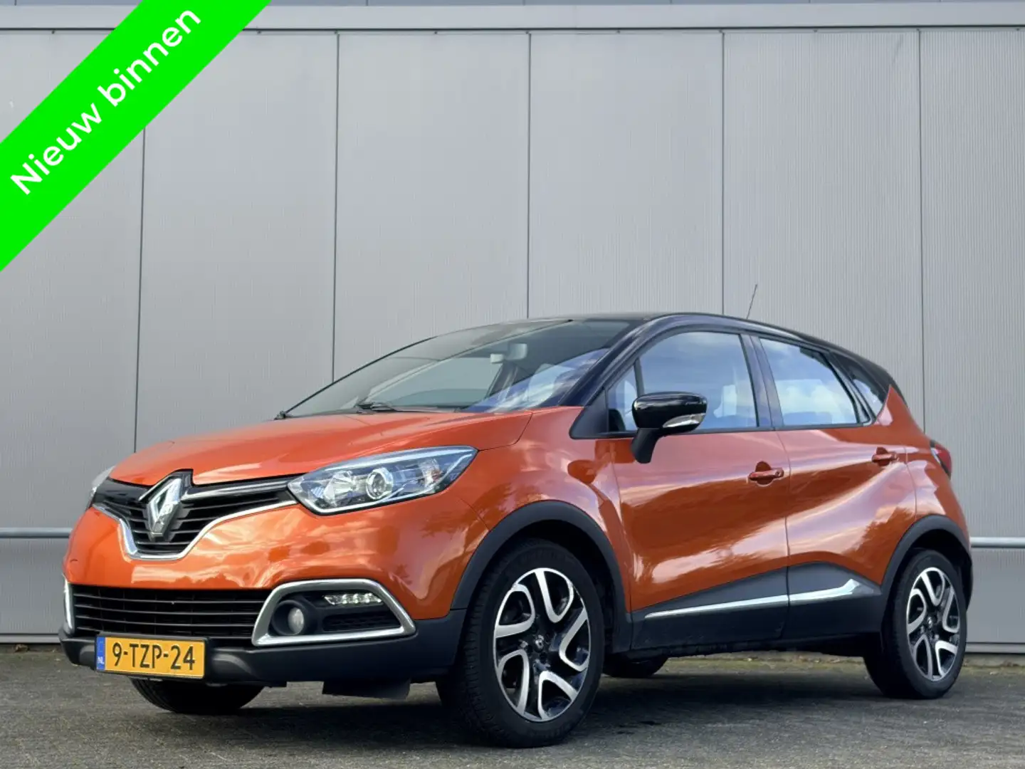 Renault Captur 1.2 TCE - airco - navi - keyless - nap - automaat Oranje - 1