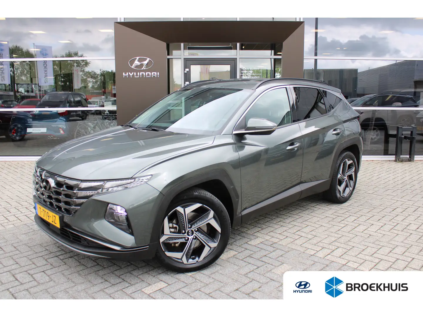 Hyundai TUCSON 1.6 T-GDI PHEV Comfort Smart 4WD | Elektrische ach Grijs - 1