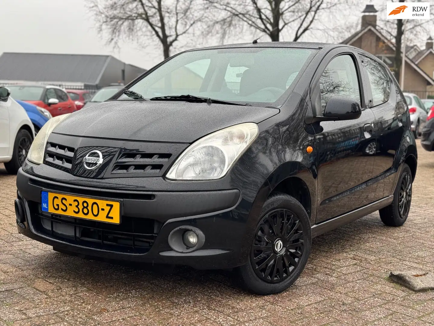 Nissan Pixo 1.0 Acenta AIRCO APK 31-08-2026 EL.RAMEN Zwart - 1