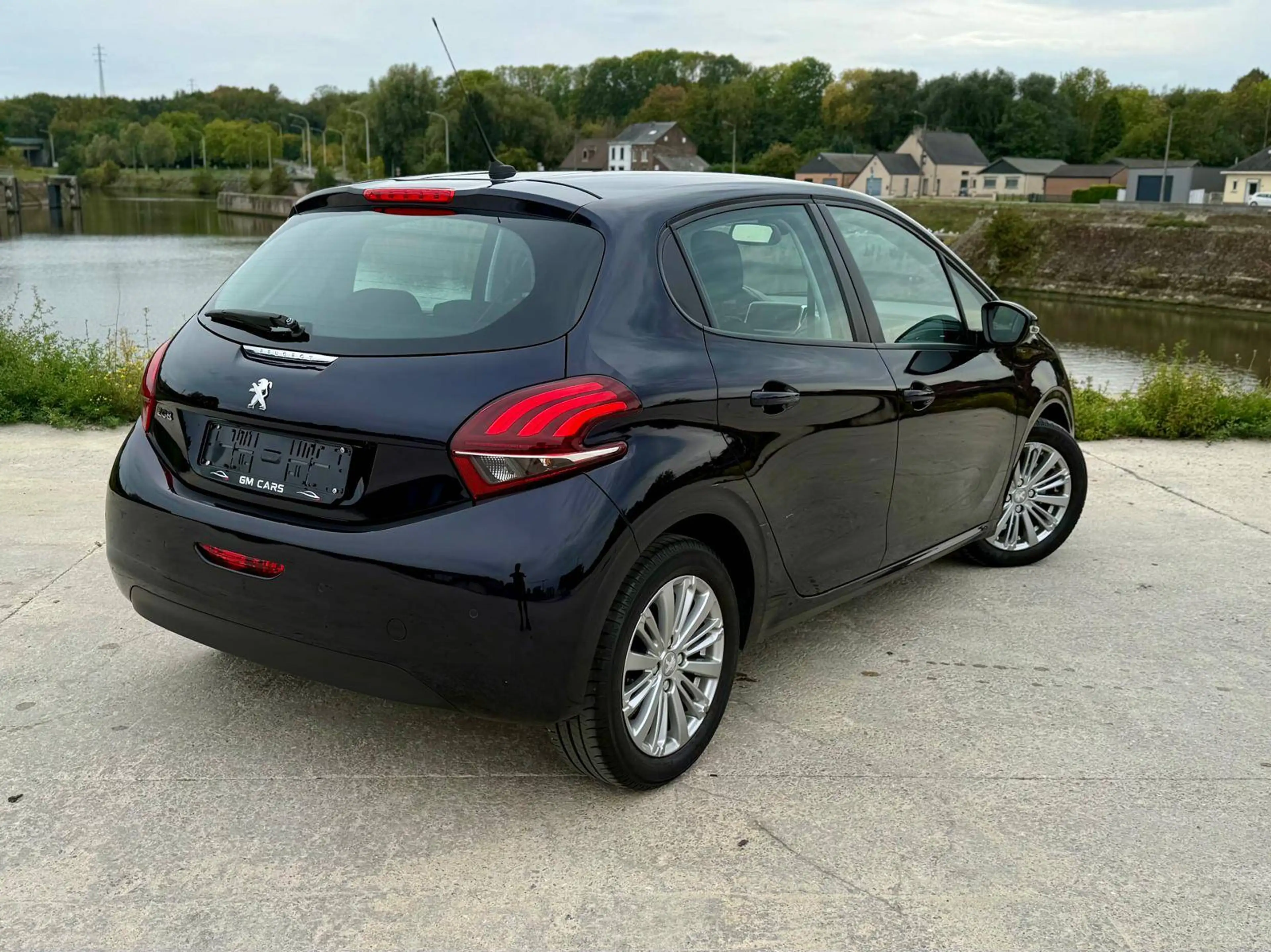 Peugeot 208 1.2i*Signature*1er*Propriétaire*Historique*Clim*Navi — photo 4
