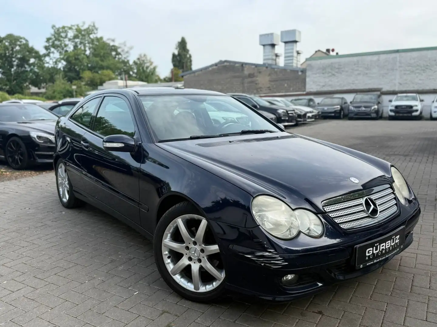 Mercedes-Benz C 180 Sportcoupe*Navi*Pano*Szhz*Sportpak Blauw - 1