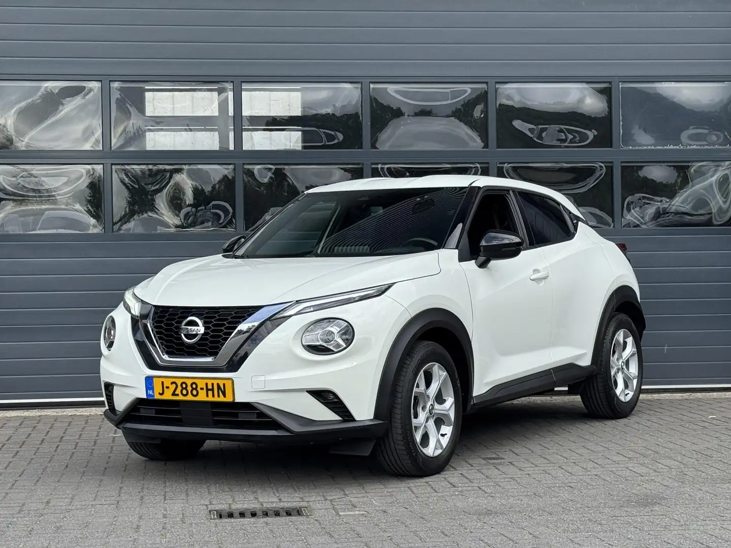 Nissan Juke 1.0 DIG-T N-CONNECTA I ACHTERUITRIJCAMERA I APPLE Weiß - 1