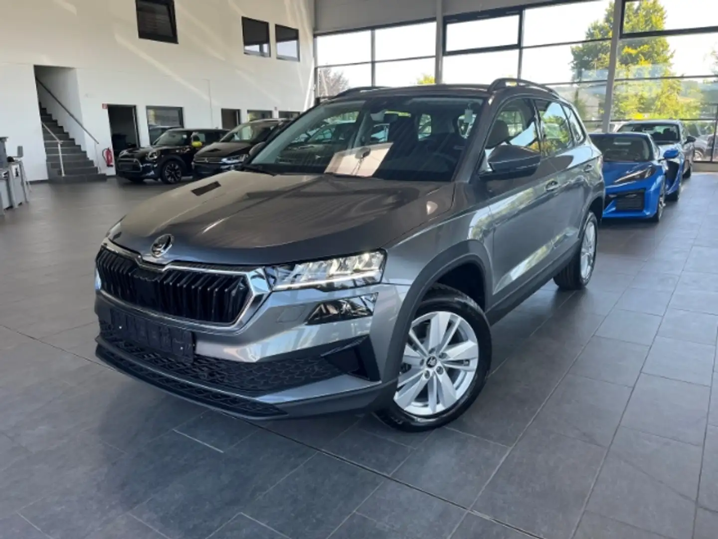 Skoda Karoq Selection 1.5 TSI LED Kamera Navi Digi Cockpit LED Grijs - 1