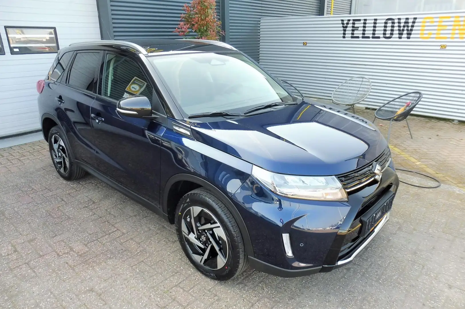 Suzuki Vitara 1.4 Boosterjet Style Smart Hybrid Panoramadak Blauw - 2