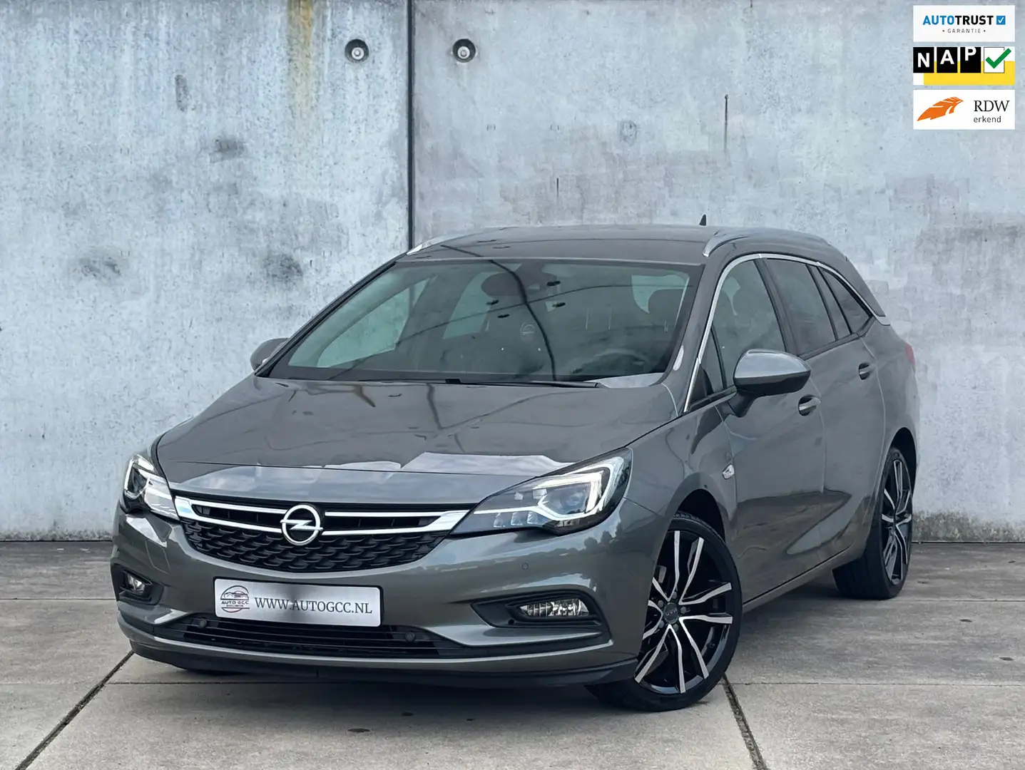 Opel Astra Sports Tourer 1.4 INNOVATION NAVI NAP TREKHAAK PDC Grijs - 1