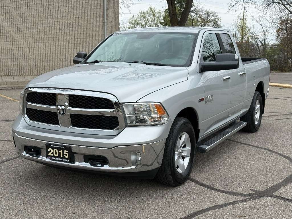2015 RAM 1500 4WD Quad Cab 140.5 SLT