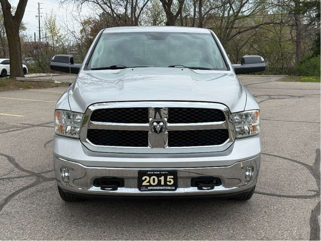 2015 RAM 1500 4WD Quad Cab 140.5 SLT — снимка 1