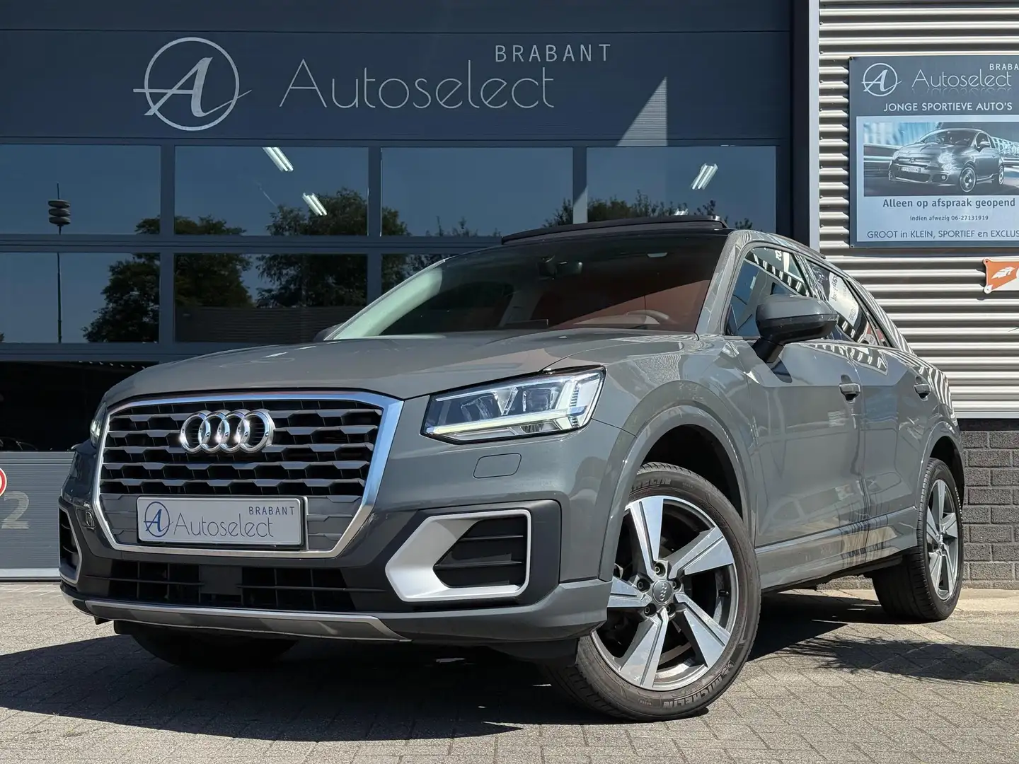Audi Q2 1.4 TFSI CoD Sport Pano Navi LED Grijs - 1