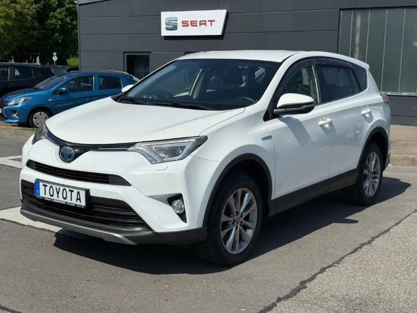 Toyota RAV 4 2.5 4x2 HybridTeam D NAVI+ACC+AHK Weiß - 1