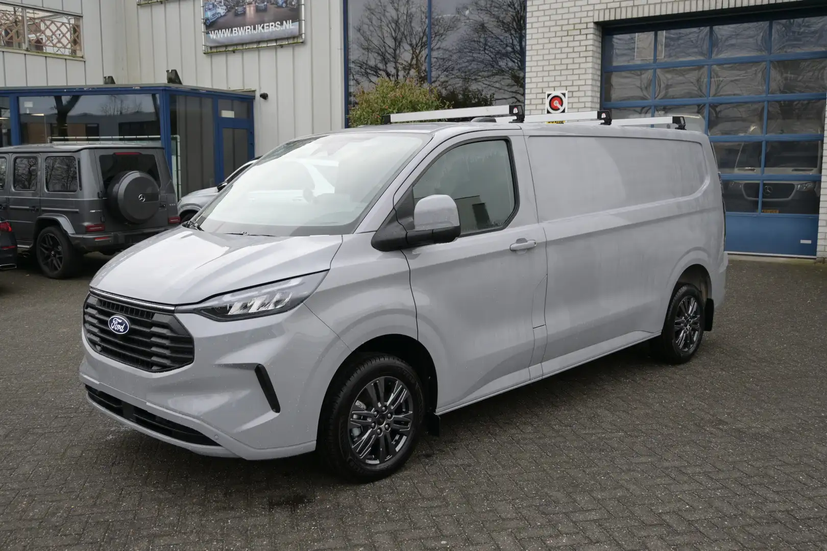 Ford Transit Custom 320L L2 2.0 TDCI 170 pk Limited Dakdragers, Trekha Gris - 1
