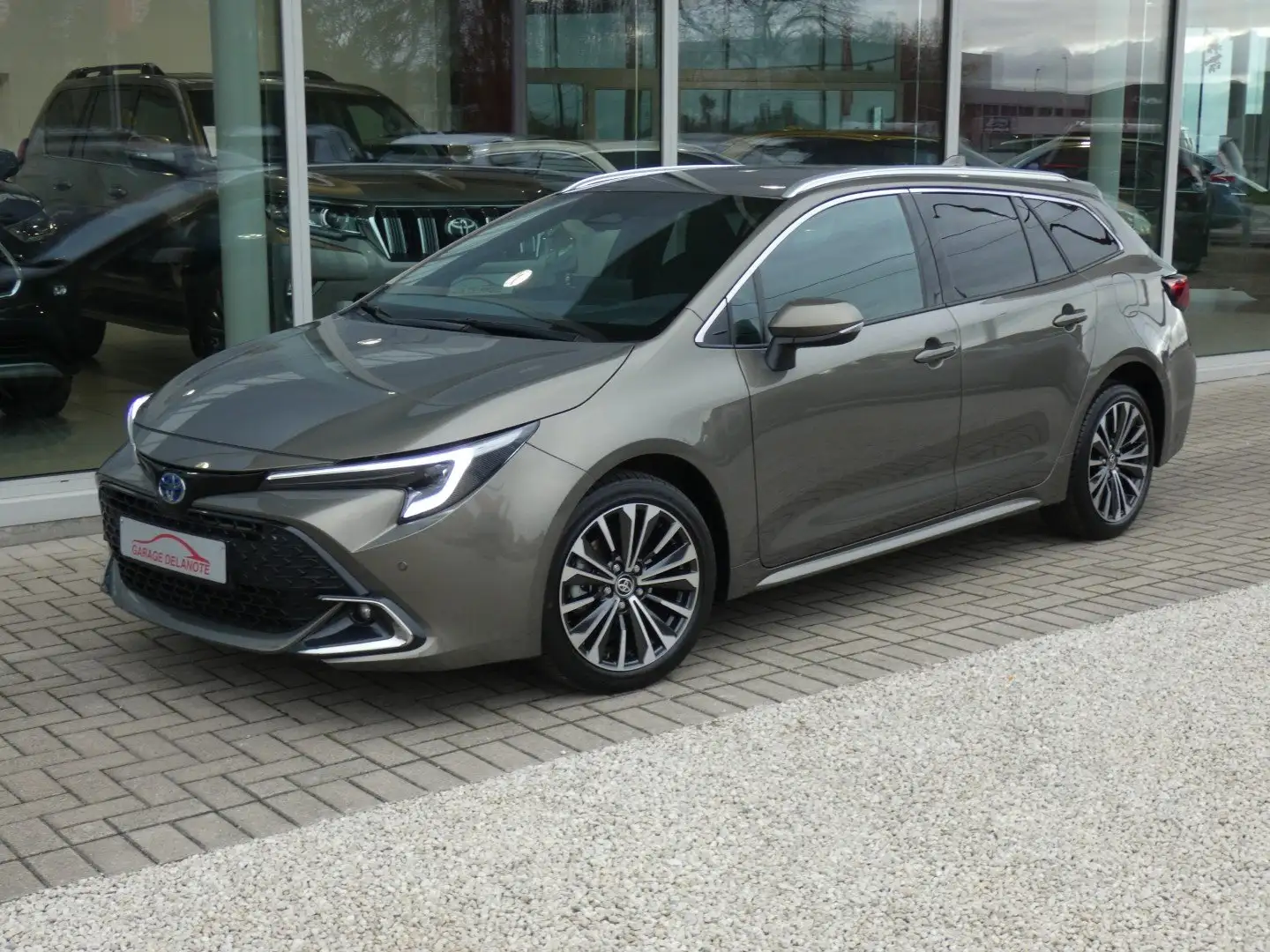 Toyota Corolla TS 1.8 Hybrid STYLE 140pk FACELIFT+Zetelverwarming Bronzo - 1
