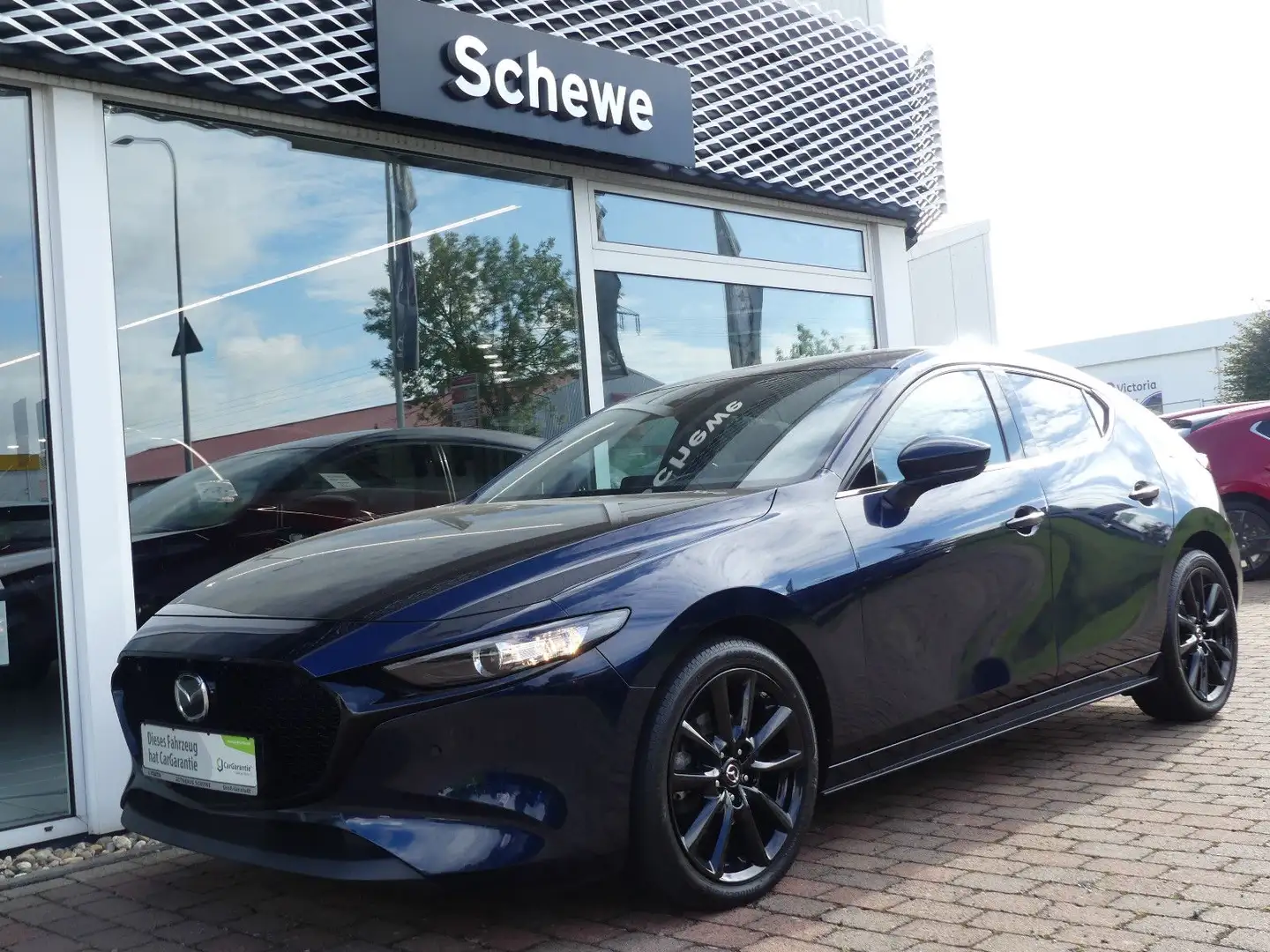 Mazda 3 e-SKYACTIV-G M-Hybrid Homura + Premium-Paket Bleu - 1