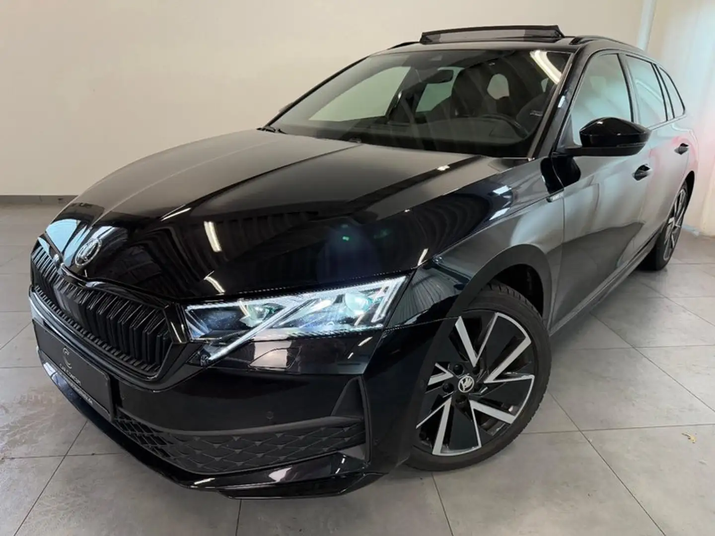 Skoda Octavia Combi 2.0 TDI DSG Sportline PANO AHK 18" Schwarz - 1
