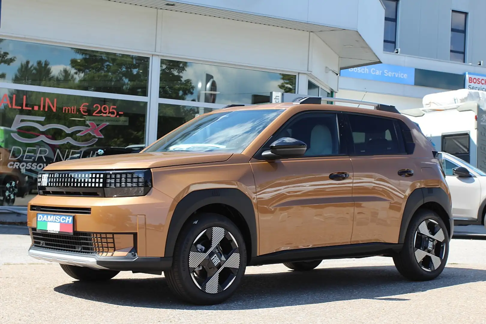 Fiat Grande Panda Hybrid mHEV 110 6-Gang eDCT La Prima Gold - 1