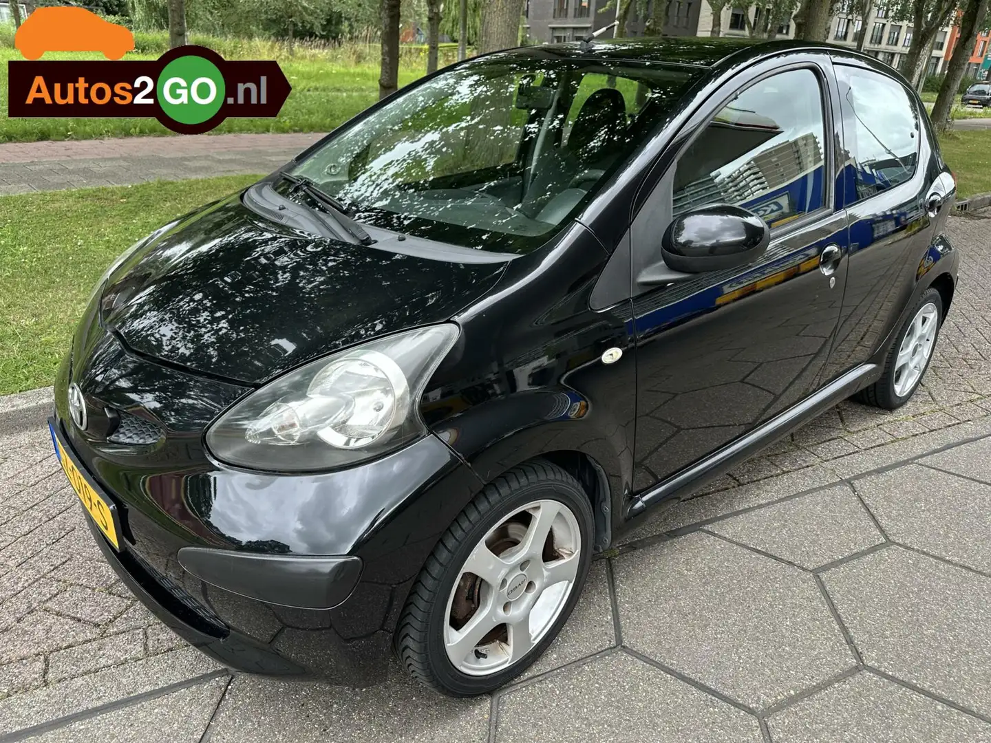 Toyota Aygo 1.0-12V + I Airco I Sport I 5deurs I rijklaar I Zwart - 1