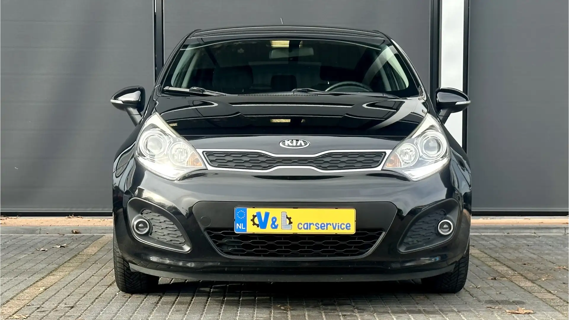 Kia Rio 1.2 CVVT Super Pack / Clima / Cruise / PDC Zwart - 2