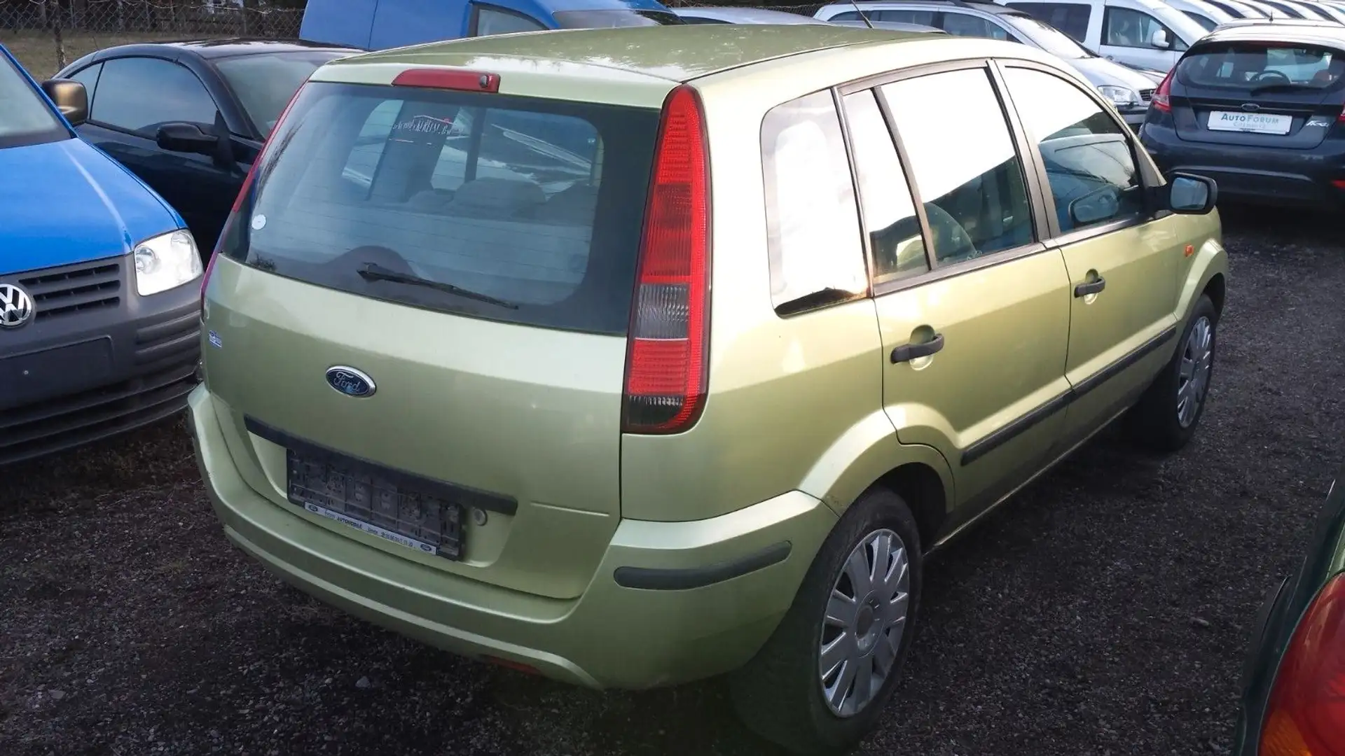 Ford Fusion Oro - 2
