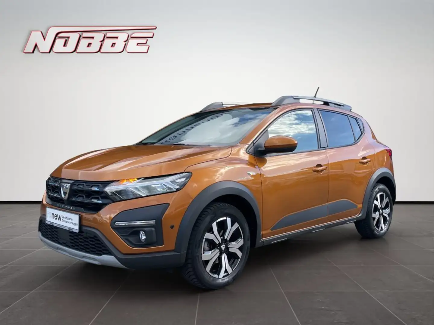 Dacia Sandero Stepway TCe90 Comfort *Allwetter+Sitzheiz* Oranje - 1