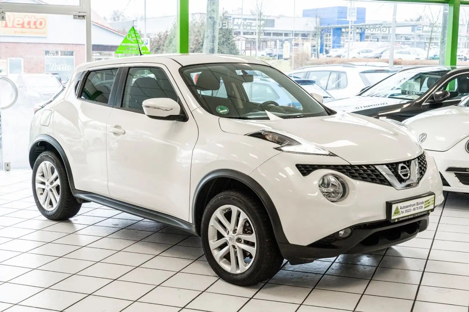 Nissan Juke 1.2 Benzin DIG-T Tekna 116 PS Navi Kamera Weiß - 1