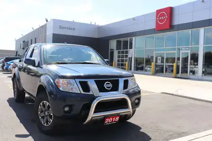 Blue 2018 Nissan Frontier Pickup Truck Four-Wheel Drive Manual