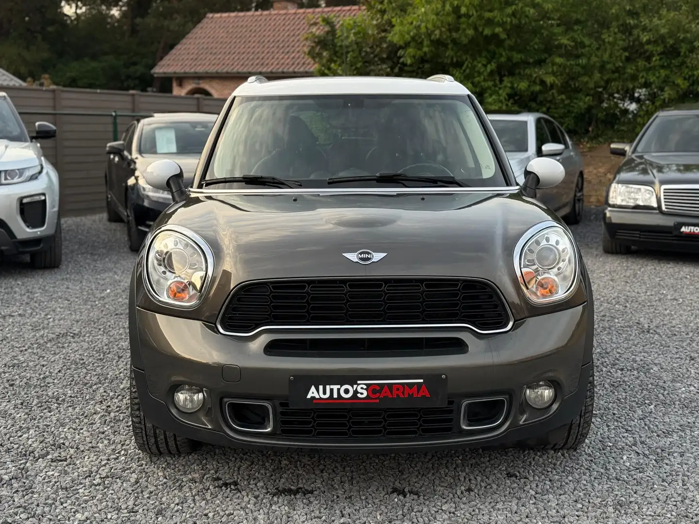 MINI Cooper SD Countryman 2.0 D S ALL4 Airco CruiseC ParkeerS Leder * Szürke - 2