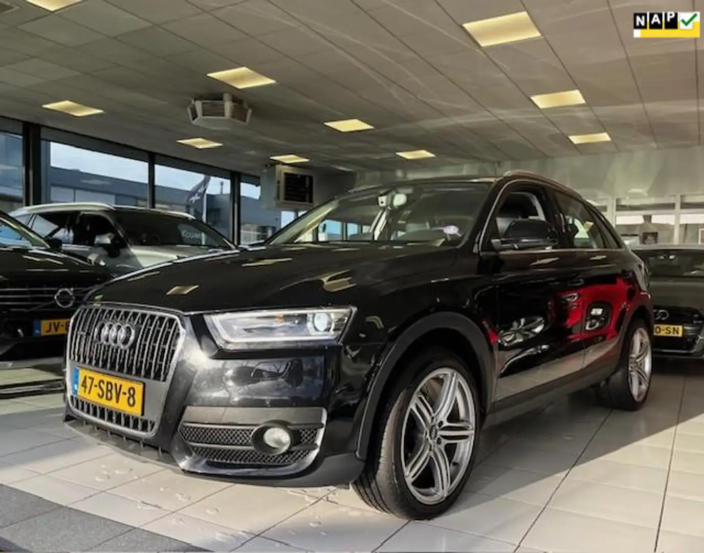 Audi Q3 2.0 TFSI quattro/Dealer onderhouden/Automaat/NAP/N Zwart - 1