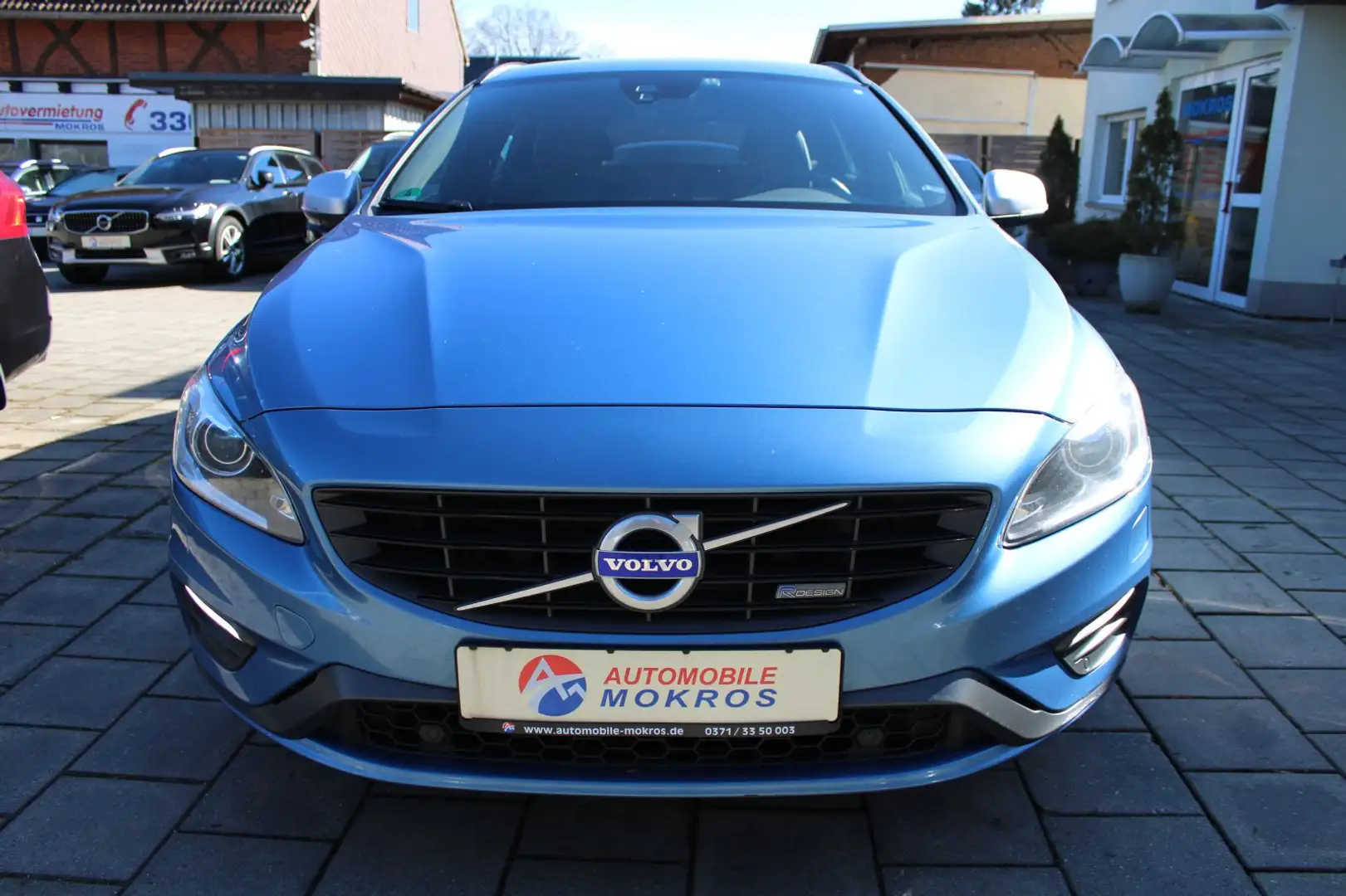 Volvo V60 T4 R-design BiXenon Leder Navigation Tempomat PDC Blauw - 2