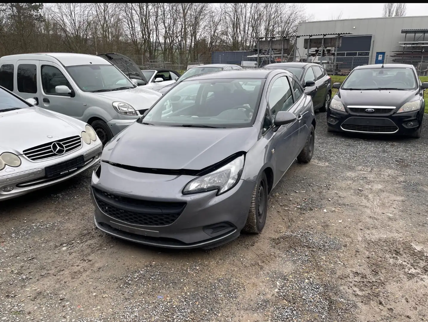 Opel Corsa 1.4 (ecoFLEX) Start/Stop Selection,Auto fährt Grau - 1