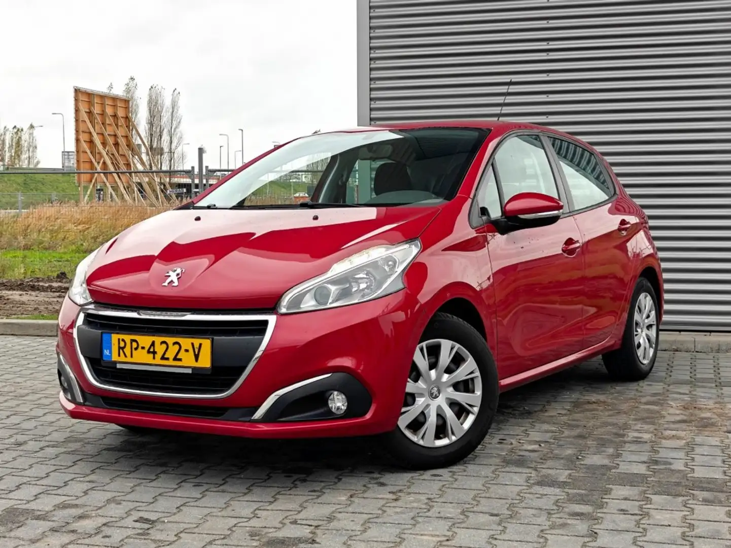 Peugeot 208 1.2 - AIRCO - Park. sens. - dealer onderhouden Rood - 1