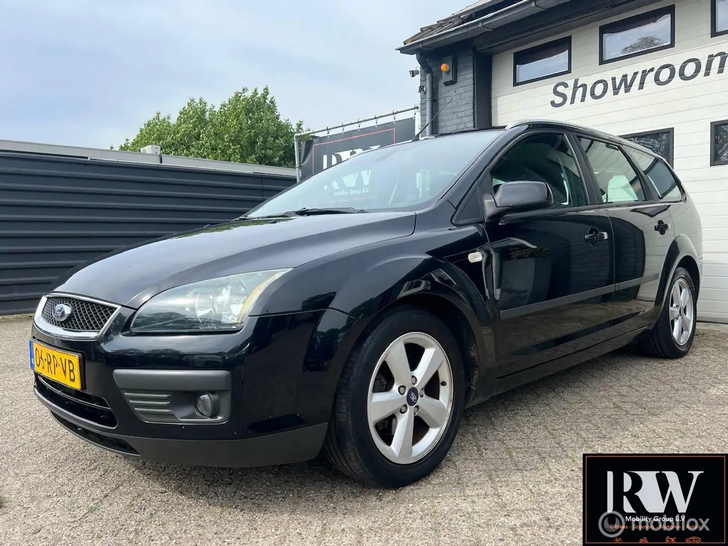 Ford Focus Wagon 1.6-16V Ambiente Airco, trekhaak Zwart - 1
