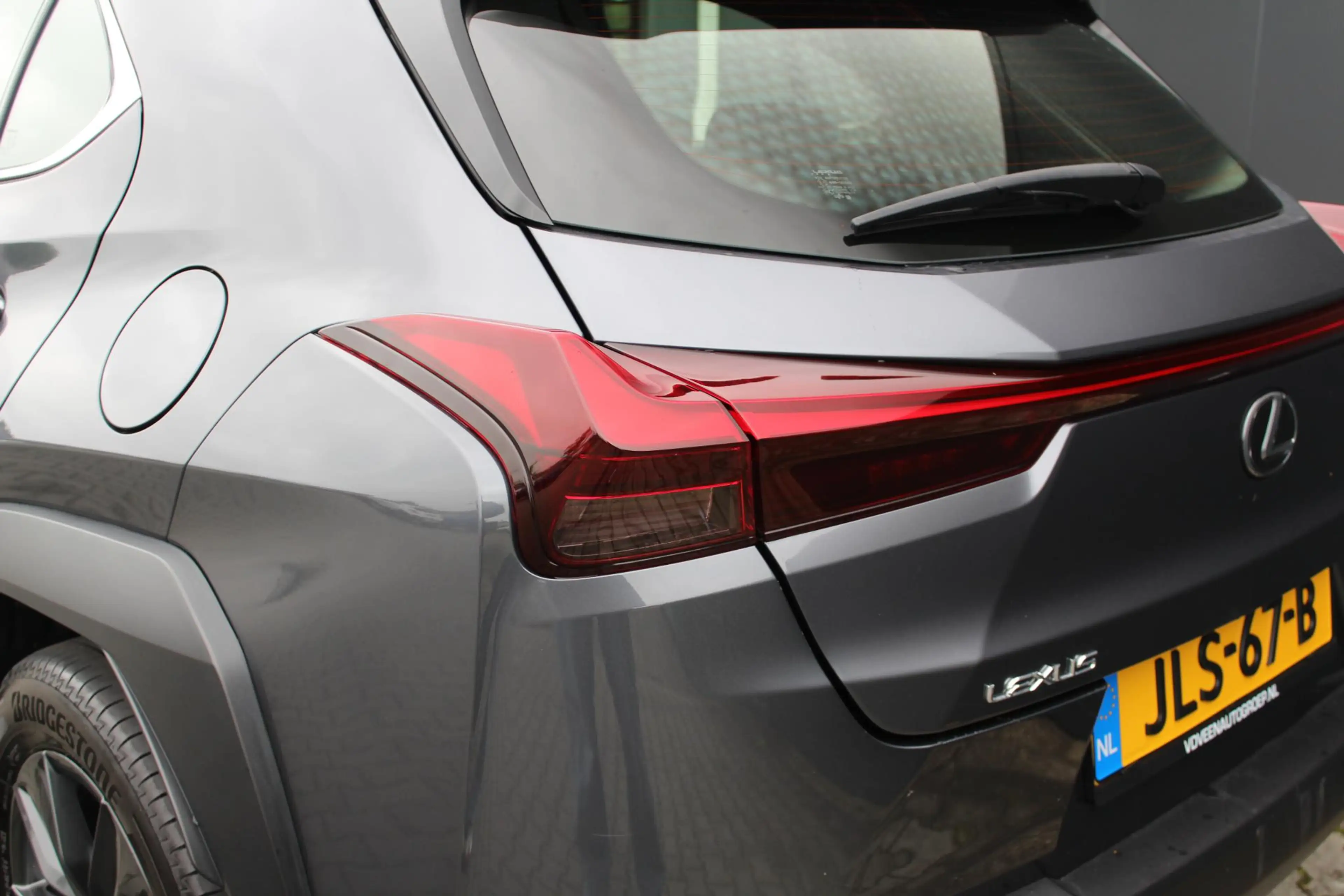 Lexus UX 250h | Incl. 12 maanden garantie | Achteruitrijcamera | — photo 7
