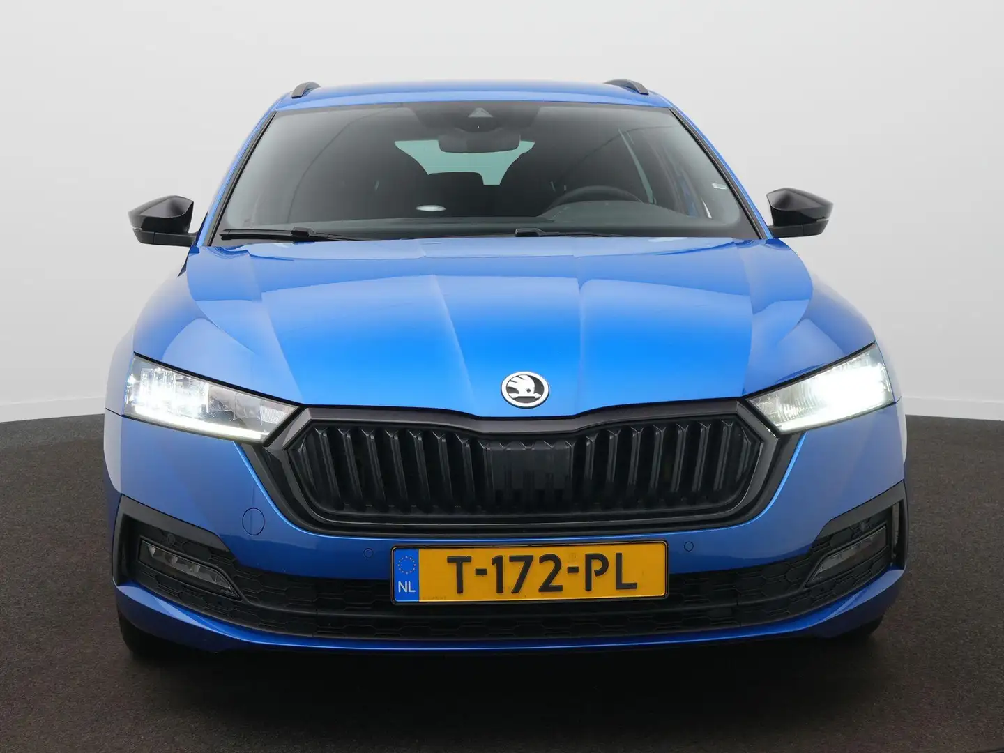 Skoda Octavia Combi 1.0 e-TSI Sport Business | Navigatie | Parke Blauw - 2
