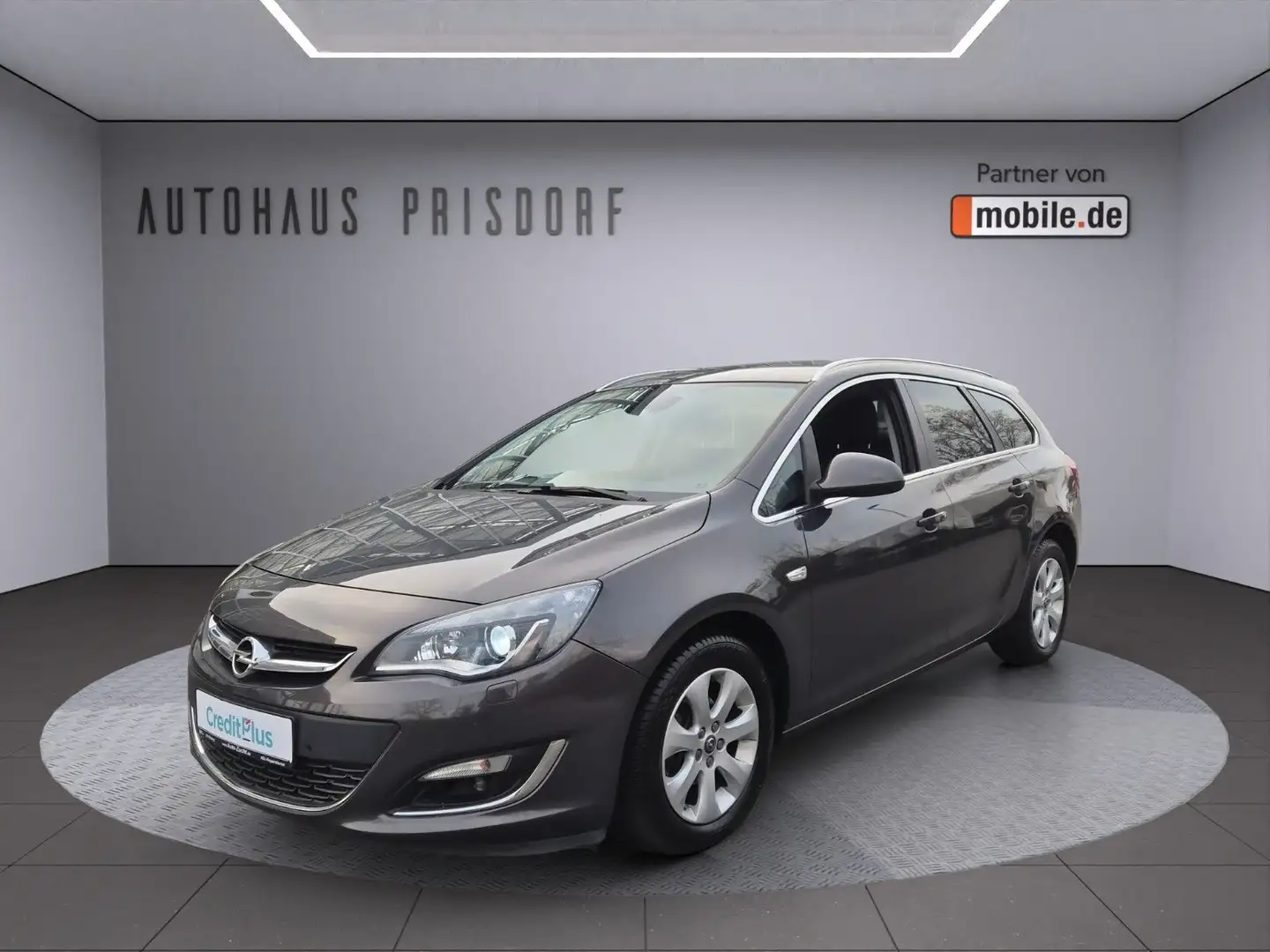 Opel Astra J ST Exklusiv Automatik/Xenon/Navi/RFK/Shz Gris - 1