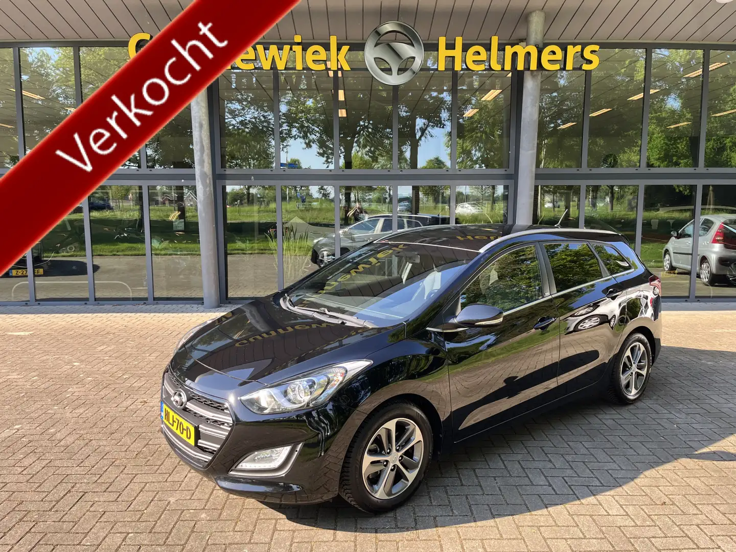 Hyundai i30 1.4 | LAGE KM STAND | STOEL + STUURVERW | AIRCO | Zwart - 1