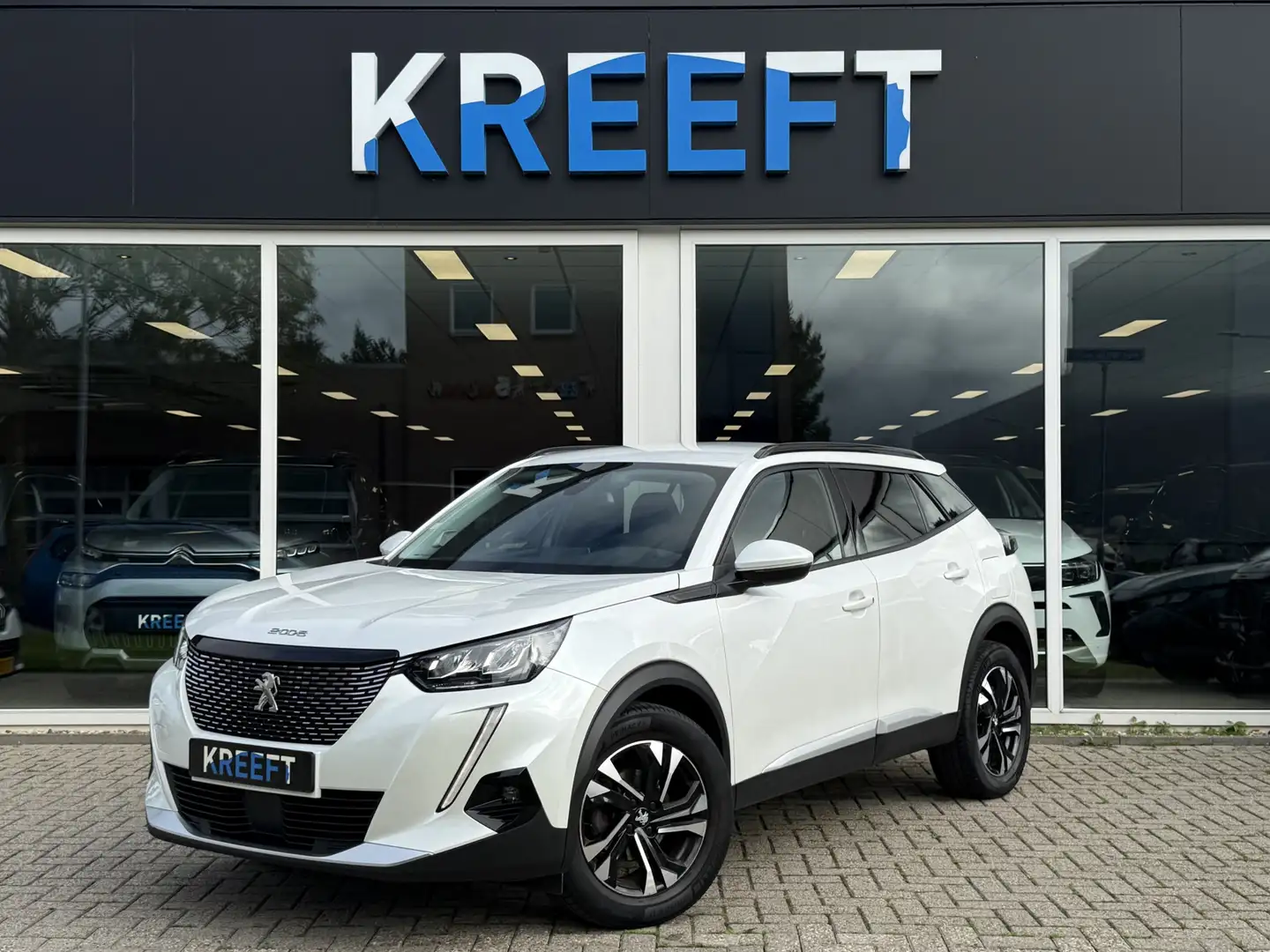 Peugeot 2008 1.2 PureTech Allure Automaat Weiß - 1