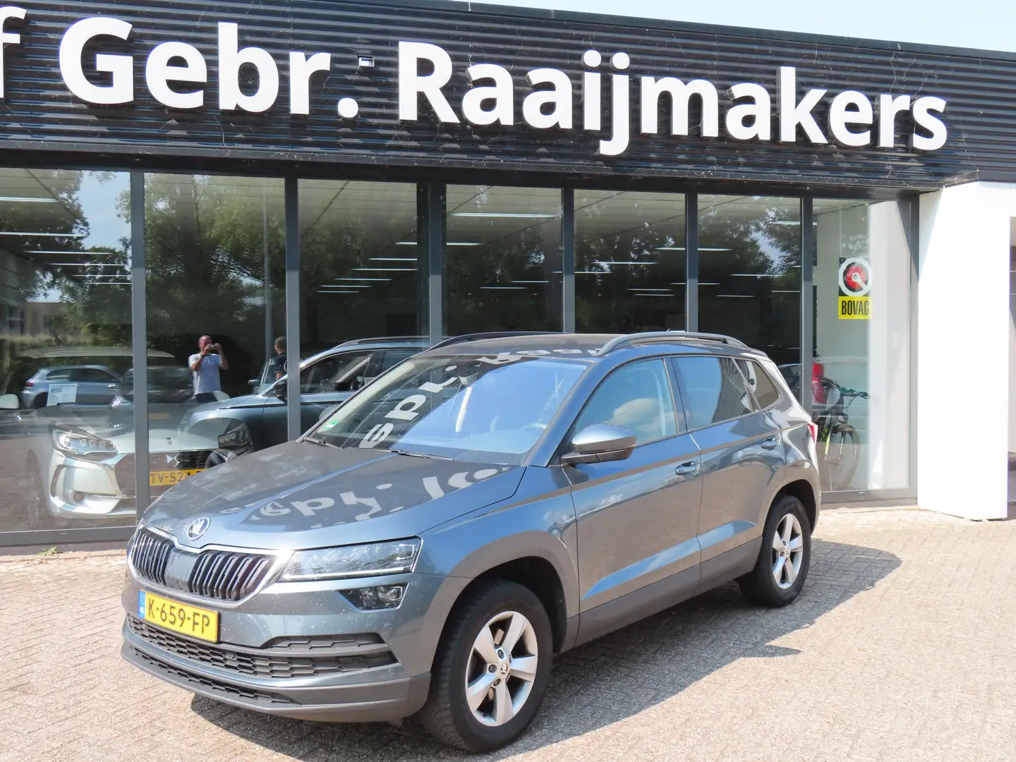 Skoda Karoq 1.5 TSI ACT Business Edition*ACC*LED*Navi*EXPORTPR Grijs - 1