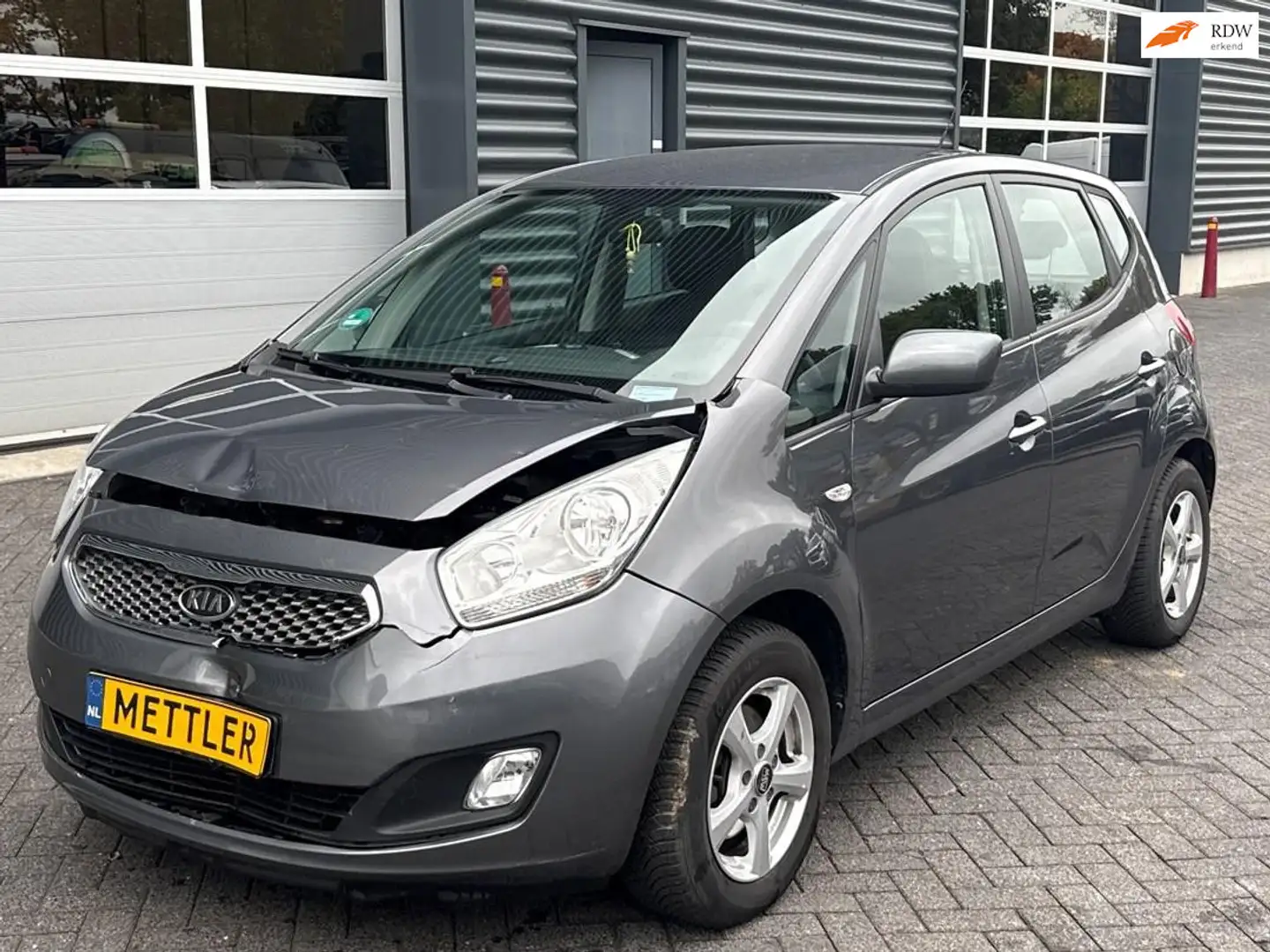Kia Venga 1.4 CVVT Seven, airco, cruise control, navigatie, Grijs - 1