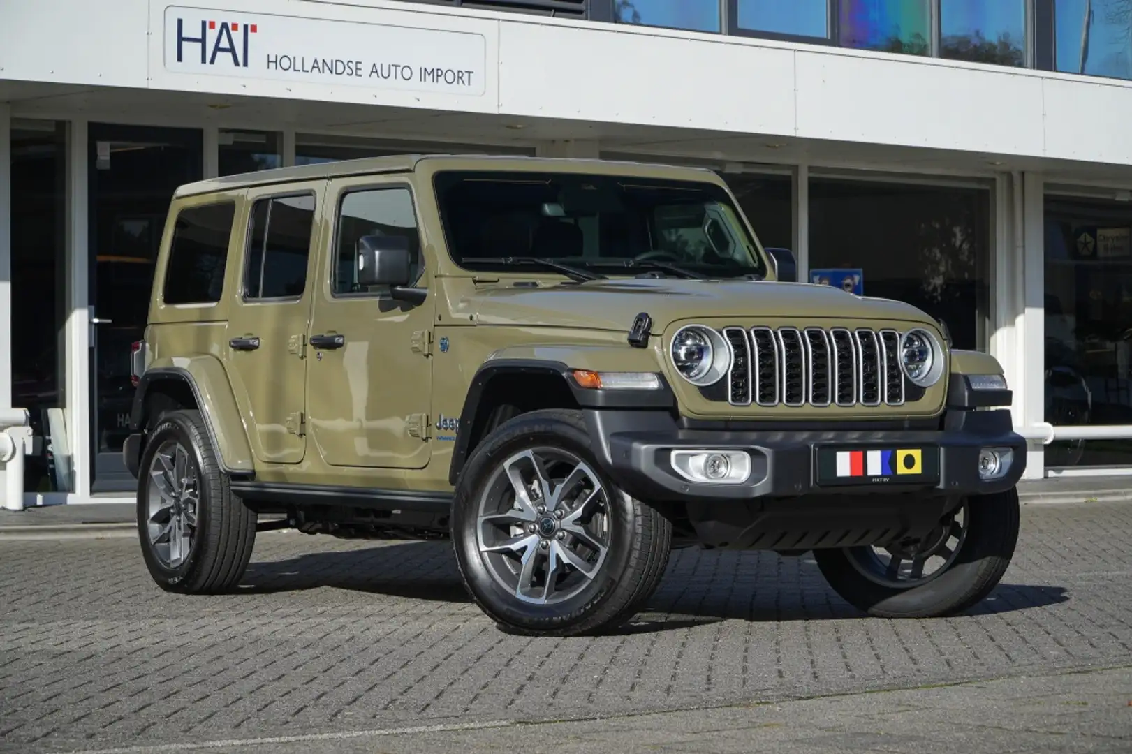 Jeep Wrangler Unlimited 4xe 380 Sahara I Nw. Model I 20 inch I E Groen - 1