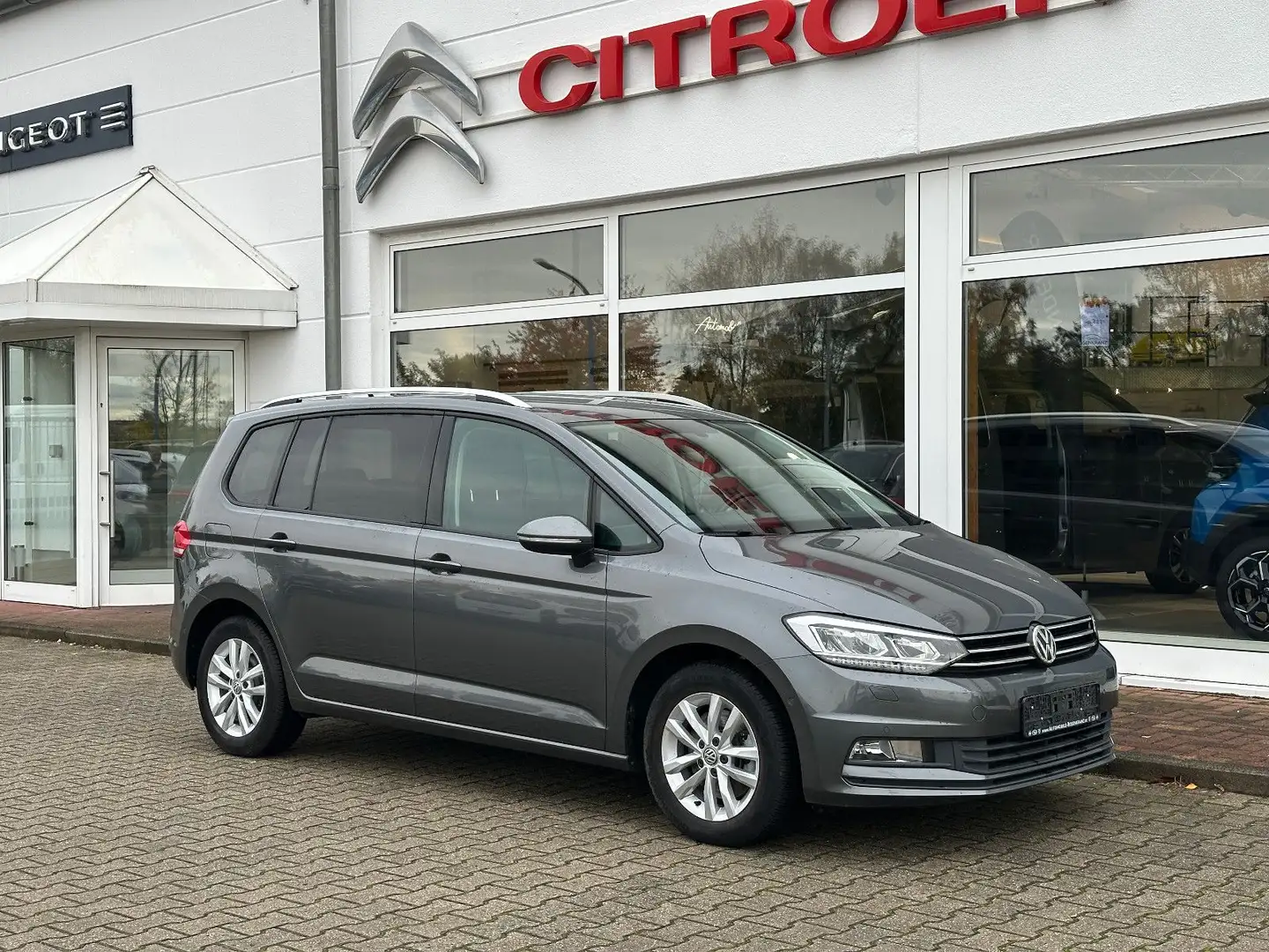 Volkswagen Touran 1.4 TSI Comfortl. | AHK - Nav - 7-Sitzer Grau - 1