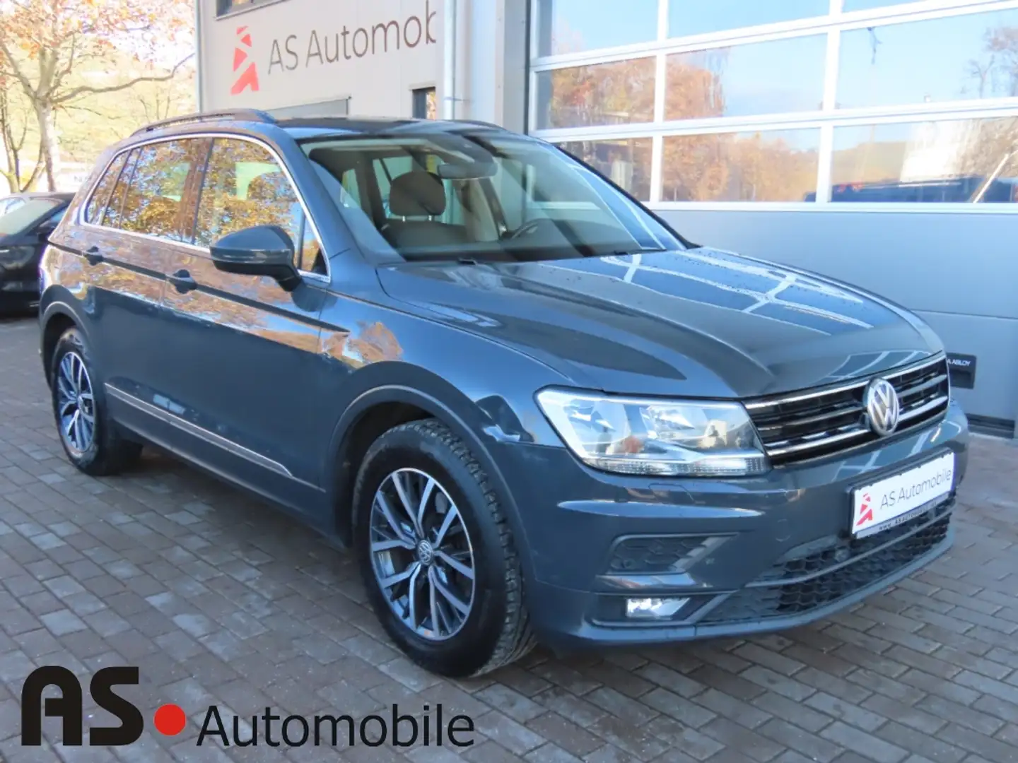 Volkswagen Tiguan 2.0TDI Comfortline 1.Hd*Navi*SHZ*PDCv+h*8-f Grau - 1