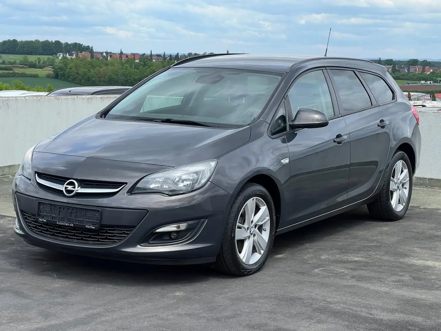 Opel Astra Sport 1.6 CDTI 100 KW Navi PDC Grijs - 1