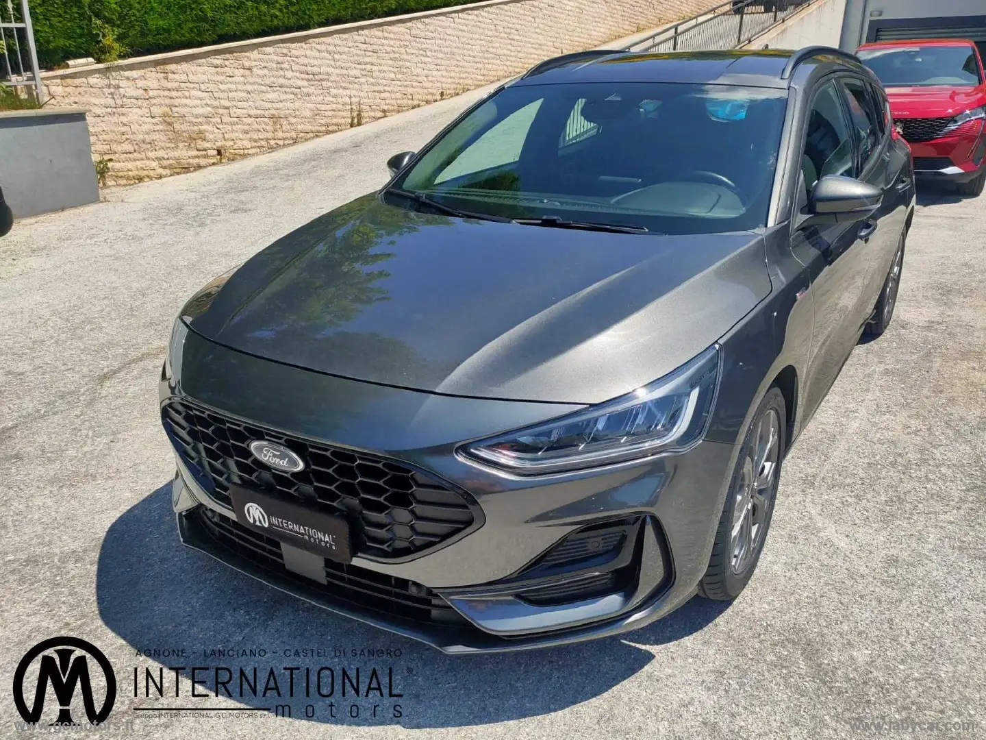 Ford Focus 1.0 EcoB.Hyb.125CV Pow.SW ST-L.Sty Grijs - 1