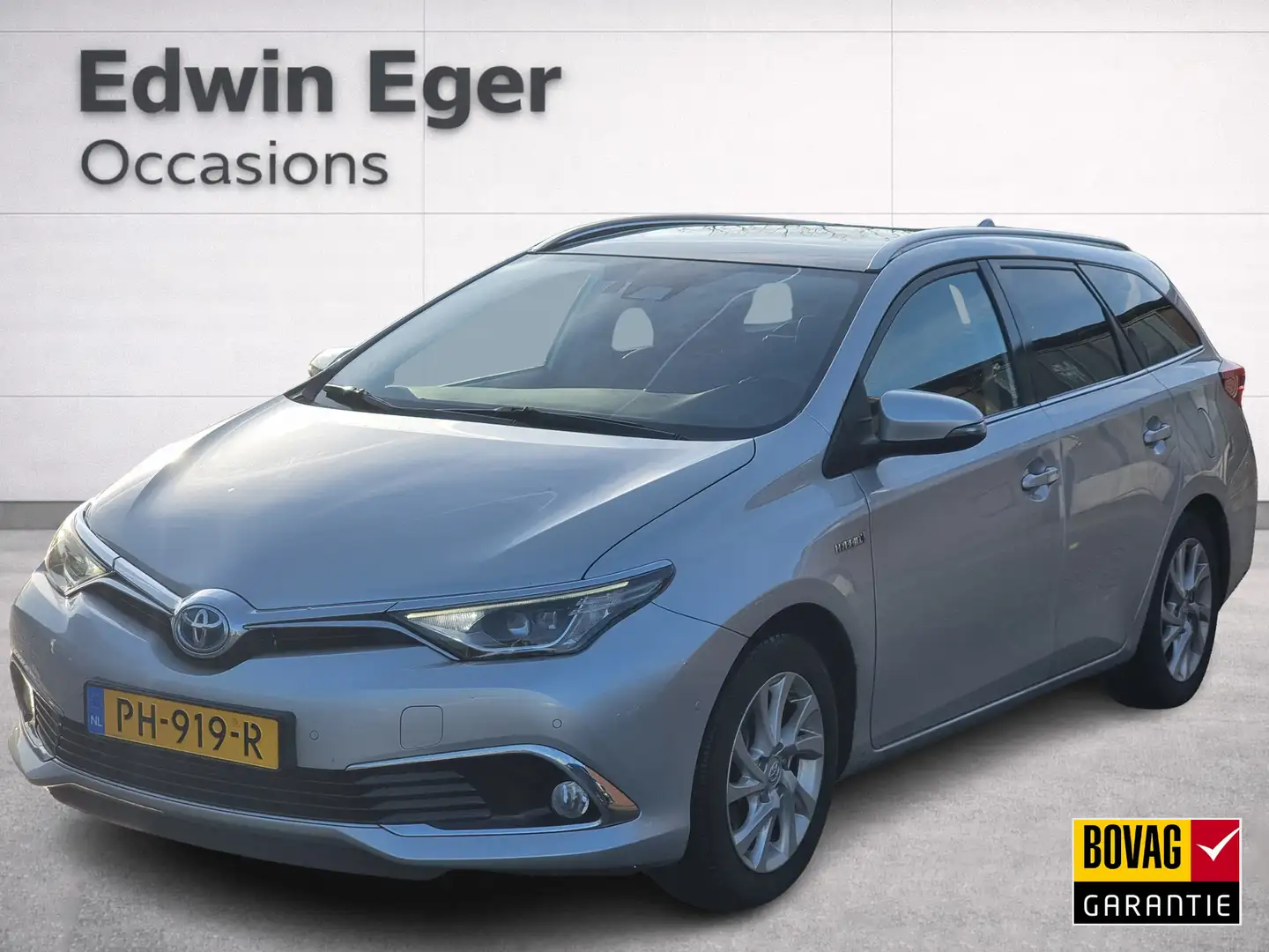 Toyota Auris Touring Sports 1.8 Hybrid Executive | Panorama dak Grau - 1